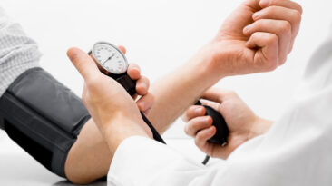 Blood pressure measuring studio shot